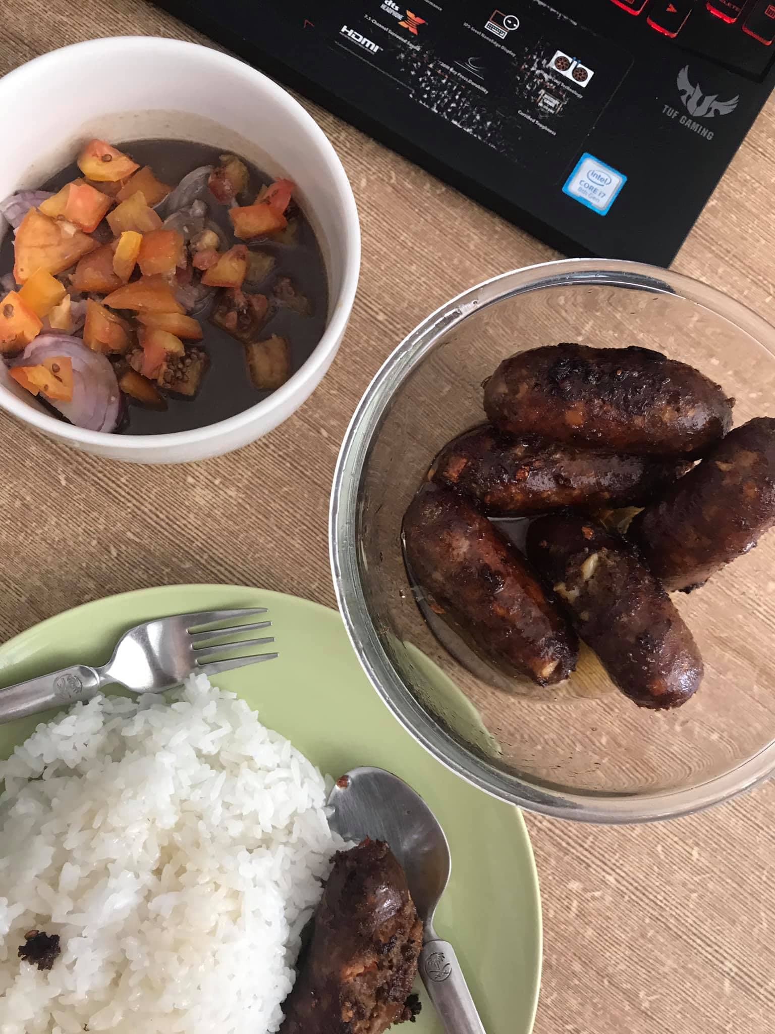 Home-cooked longganisa meal with rice and vinegar dipping sauce